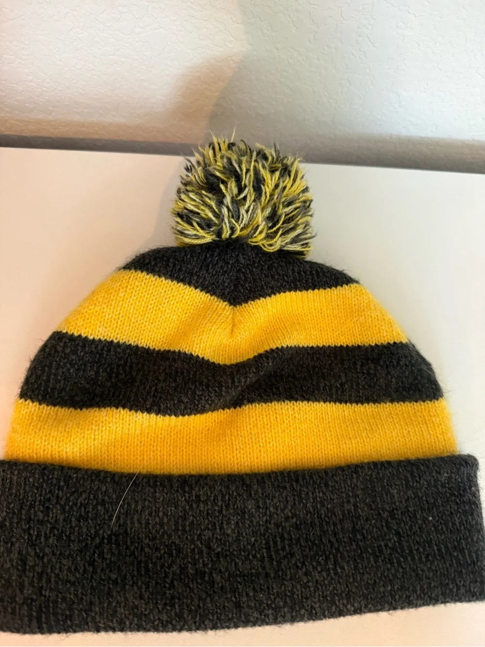 Kids Yellow & Black Striped Knit Pom Beanie with Harry Potter Hufflepuff Crest